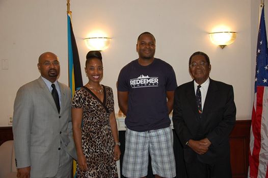 Photo: WASHINGTON, D.C. -- Mr. Andrew Russell, a Bahamian who currently lives in Dallas, Texas, paid a courtesy call on His Excellency Dr. Eugene Newry, Bahamas Ambassador to the United States, at the Embassy of the Bahamas, 2220 Massachusetts Avenue, N.W., on Monday, July 7, 2014. Mr. Russell, who graduated from Nassau Christian Academy, went to college in Chattanooga, Tennessee, and is presently a student at Redeemer Seminary in Dallas. He is in Washington, D.C., for a month looking at a potential job opportunity at Grace D.C. Presbyterian Church after he completes his seminary studies. Pictured from left to right are Mr. Chet Neymour, Deputy Chief of Mission, Embassy of The Bahamas; Miss Krissy Hanna, Second Secretary, Embassy of The Bahamas; Mr. Russell; and Ambassador Newry.